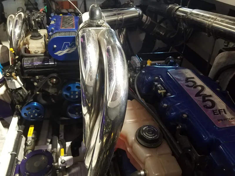 Slide: The Image of Engine compartment of a 2008 Fountain 42 Executioner boat with Mercury 525 EFI engines. - 26