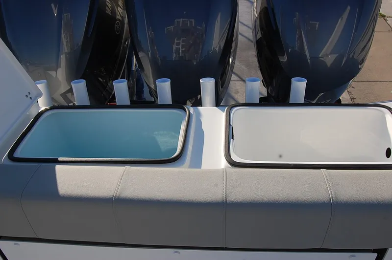 Slide: The Image of Cape Horn 36 XS 2025 model with dual livewells and rod holders. - 16
