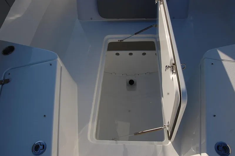 Slide: The Image of Open storage compartment on 2025 Cape Horn 36 XS boat. - 17