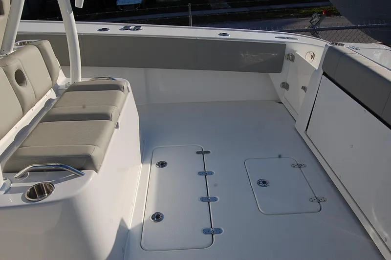Slide: The Image of 2025 Cape Horn 36 XS boat deck with seating and storage compartments. - 19