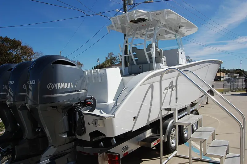 Slide: The Image of 2025 Cape Horn 36 XS boat with Yamaha engines on trailer. - 4