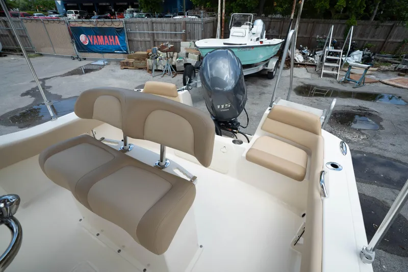 Slide: The Image of 2025 Scout 195 Sportfish boat interior with Yamaha 115 outboard motor. - 6
