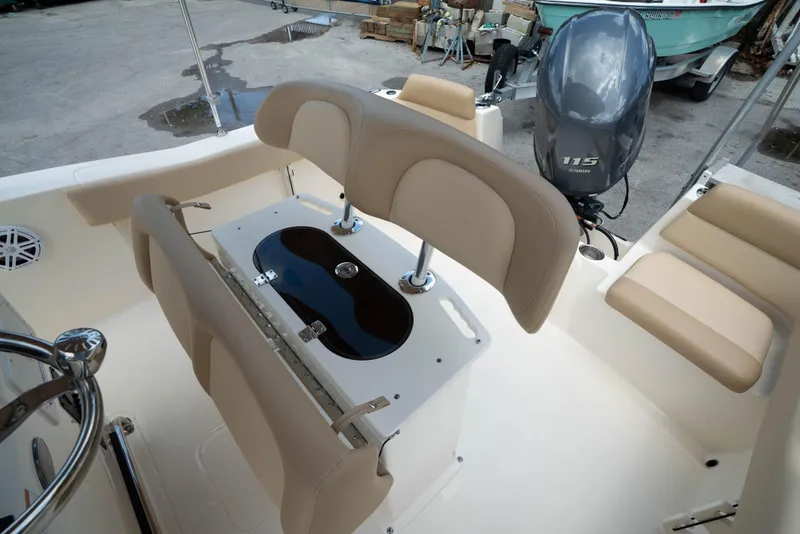 Slide: The Image of 2025 Scout 195 Sportfish boat interior with Yamaha 115 outboard motor. - 8