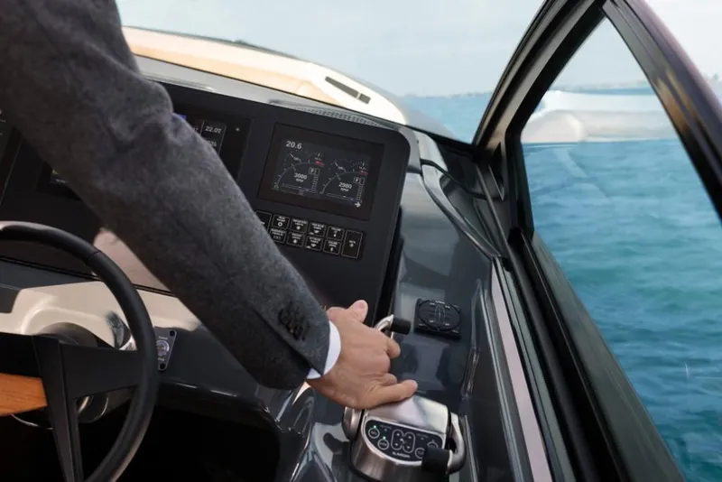 Slide: The Image of 2023 Aviara AV32 Outboard cockpit with advanced navigation controls. - 5
