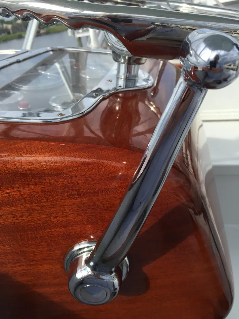 Slide: The Image of Close-up of 1965 Rybovich 37 Sportfish boat's polished wood and chrome details. - 10