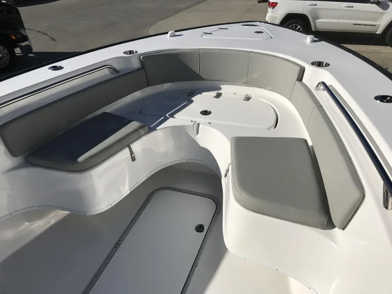 Slide: The Image of 2024 Cape Horn 27 XS boat with spacious seating area and modern design. - 10