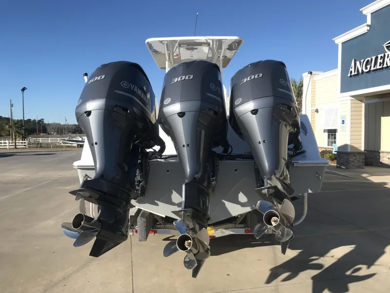 Slide: The Image of 2024 Invincible 36 boat with triple Yamaha 300 outboard engines. - 4
