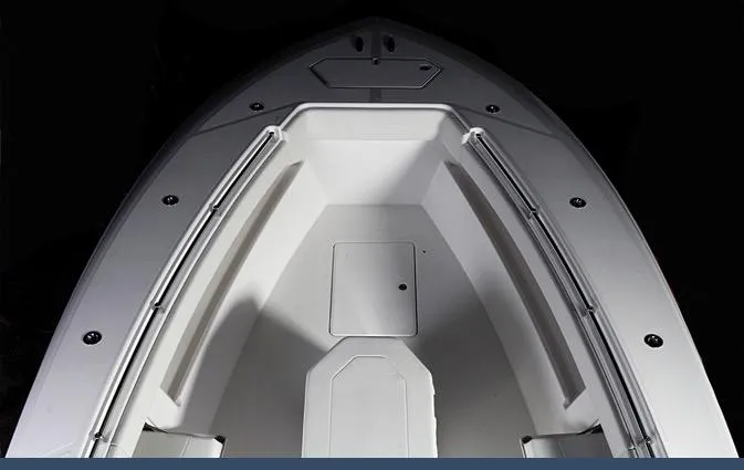 Slide: The Image of 2024 Invincible 42 boat bow with storage compartments and seating. - 5
