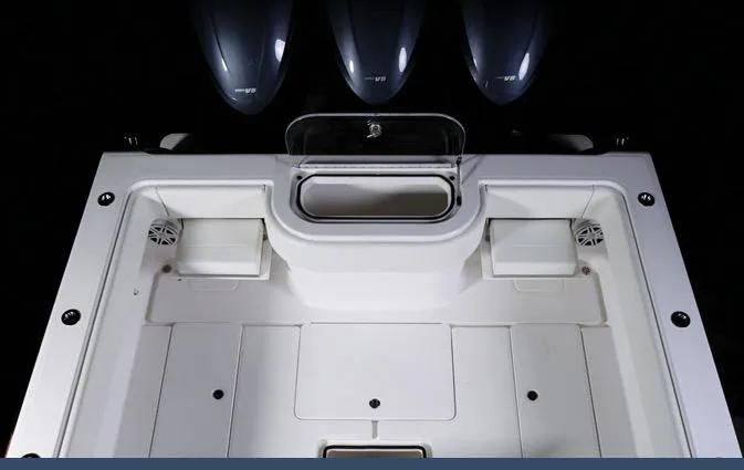 Slide: The Image of 2024 Invincible 42 boat deck with triple outboard engines. - 8