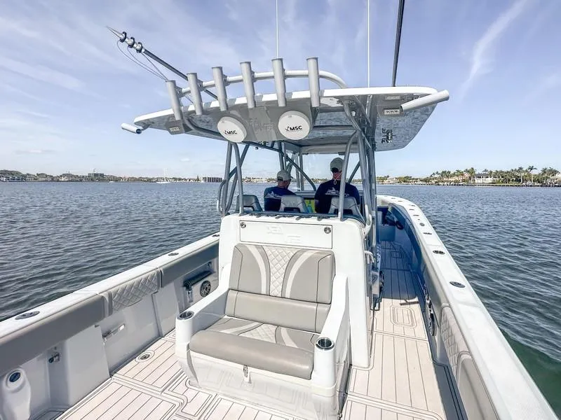 Slide: The Image of 2021 SeaVee 370z boat on water, featuring spacious seating and modern design. - 28