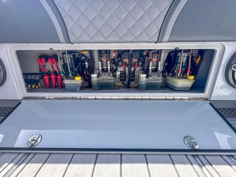 Slide: The Image of 2021 SeaVee 370z boat electrical compartment with wiring and components. - 37