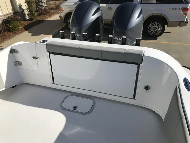 Slide: The Image of 2024 Cape Horn 27 XS boat with dual outboard engines. - 14