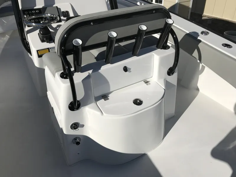 Slide: The Image of 2024 Cape Horn 27 XS boat interior with rod holders and storage compartments. - 8