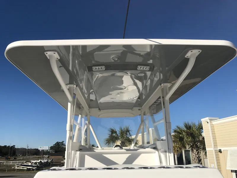 Slide: The Image of 2024 Invincible 36 boat with T-top under clear blue sky - 21