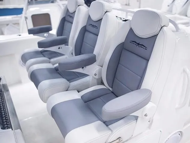Slide: The Image of 2024 Invincible 40 Catamaran luxury seating with armrests and headrests. - 10