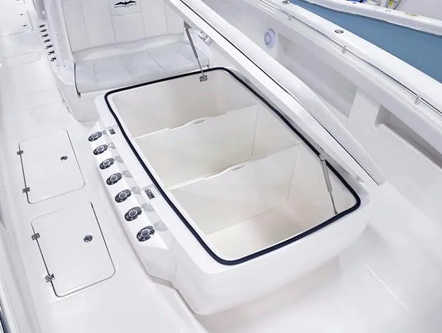 Slide: The Image of 2024 Invincible 40 Catamaran storage compartment and seating area. - 8