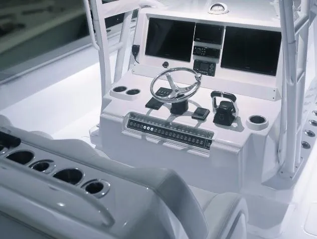 Slide: The Image of 2024 Invincible 40 Catamaran helm with advanced navigation systems and controls. - 9