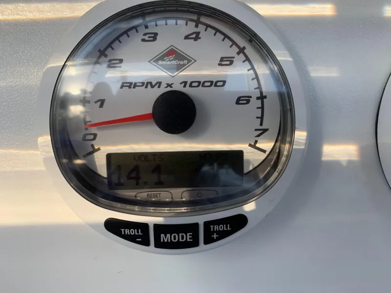 Slide: The Image of Tachometer of a 2016 Renegade 25 Center Console boat. - 16