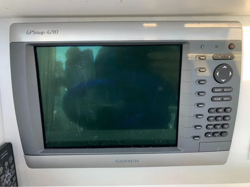 Slide: The Image of Garmin GPSmap 4210 on 2016 Renegade 25 Center Console. - 17