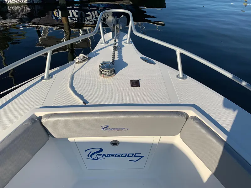 Slide: The Image of Renegade 25 Center Console boat, bow view, on calm water, year 2016. - 22