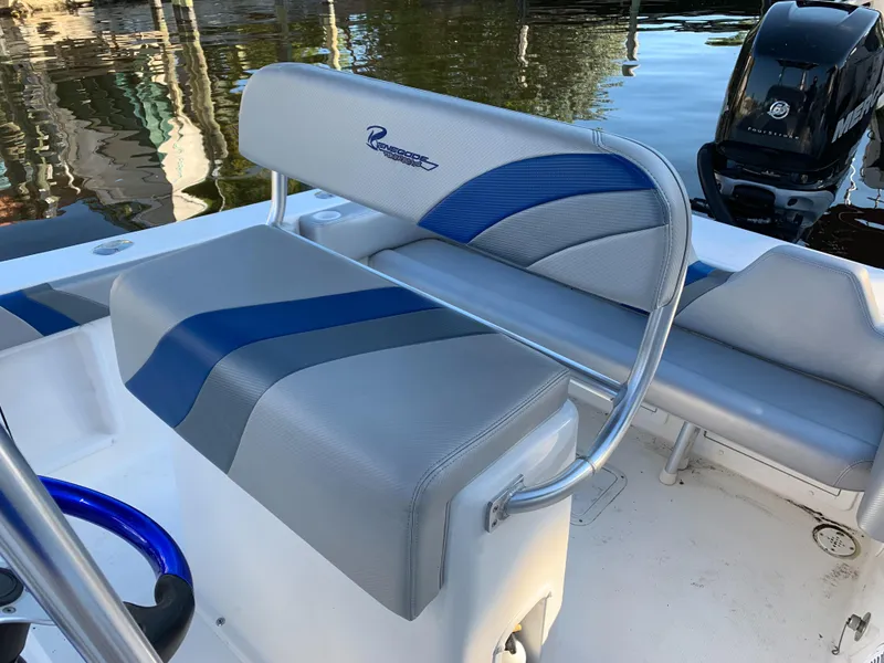 Slide: The Image of Renegade 25 Center Console 2016 with blue and gray seating. - 9