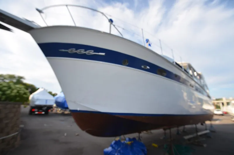 Slide: The Image of 1964 Chris-Craft Constellation yacht on dry dock for maintenance. - 5