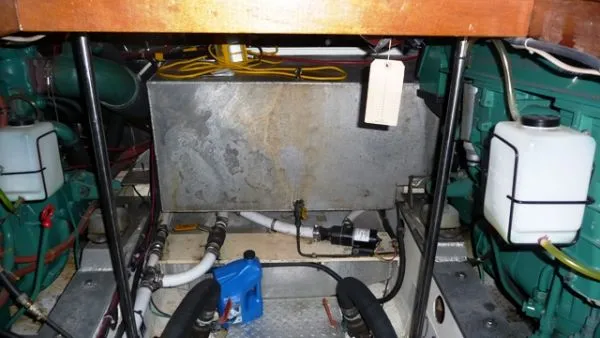 Slide: The Image of Engine room of 1988 Kadey-Krogen Silhouette yacht, showcasing detailed machinery and components. - 12