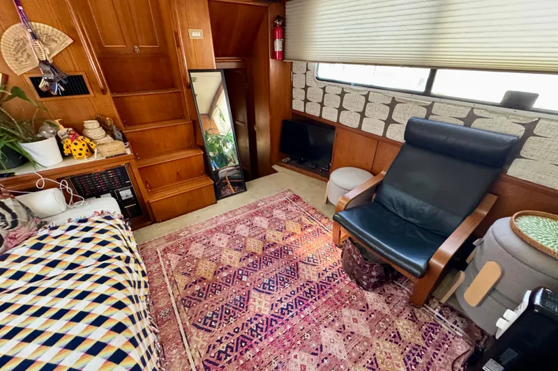 Slide: The Image of Interior of 1988 Kadey-Krogen Silhouette yacht with cozy seating and vibrant decor. - 18