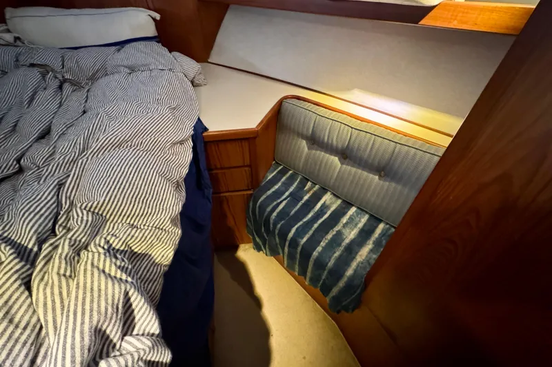 Slide: The Image of Cozy cabin interior of 1988 Kadey-Krogen Silhouette with bed and seating area. - 33