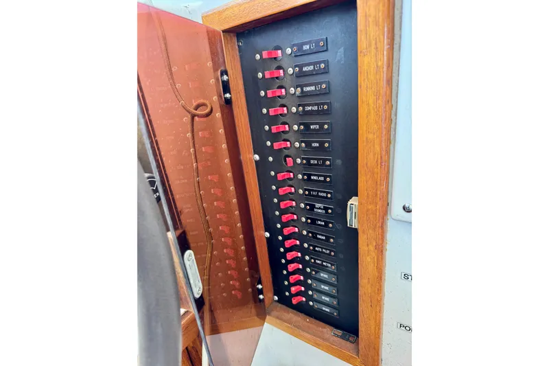 Slide: The Image of Electrical panel of a 1988 Kadey-Krogen Silhouette boat, featuring 12V DC and 110V AC systems. - 36