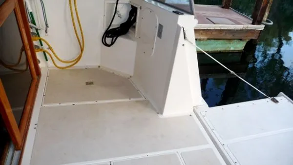 Slide: The Image of 1988 Kadey-Krogen Silhouette 42 yacht with "Escapade" nameplate, close-up view. - 39