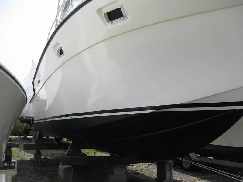 Slide: The Image of 1989 Luhrs 342 Tournament boat hull on dry dock. - 6
