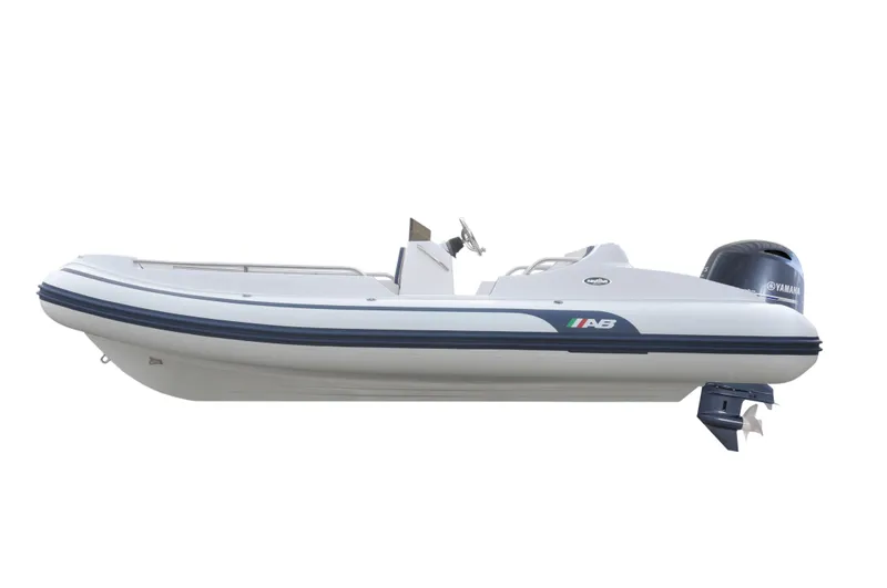 Slide: The Image of 2024 AB Inflatables 17 DLX boat, side view, white with blue accents. - 3