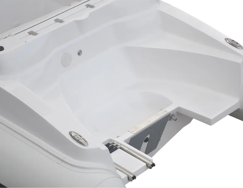 Slide: The Image of 2024 AB Inflatables 17 DLX boat interior with white seating and storage compartments. - 5