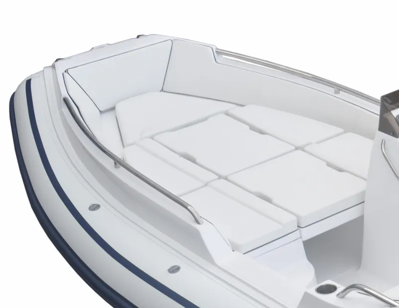 Slide: The Image of 2024 AB Inflatables 17 DLX boat with white cushioned seating area. - 6