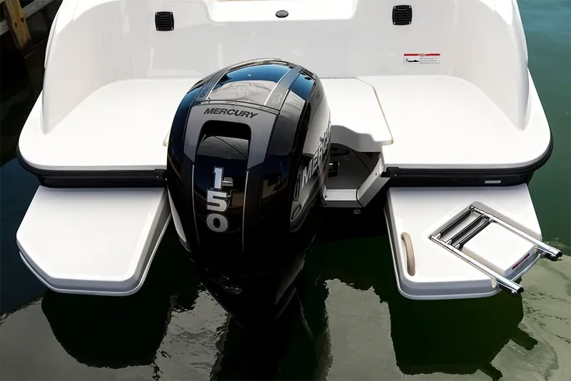 Slide: The Image of 2023 Bayliner Element E21 with Mercury 150 outboard motor and swim platform. - 22