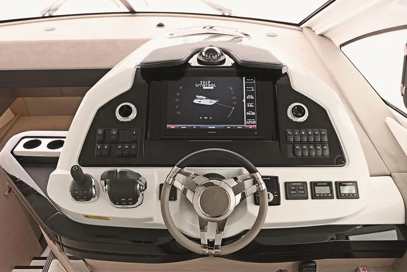 Slide: The Image of 2021 Beneteau Gran Turismo 50 Sportfly helm with advanced navigation system. - 13