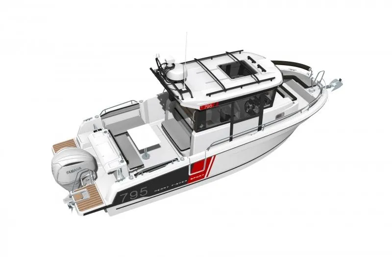 Slide: The Image of 2023 Jeanneau NC795 Sport Series 2 boat cruising on open water with mountains in the background. - 29