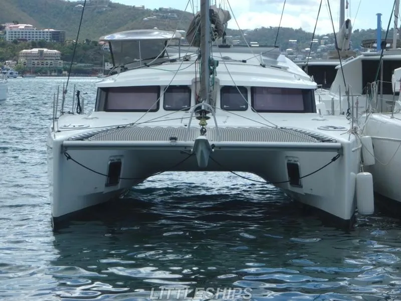 The Image of Fountaine Pajot MAHE EVO 2015 catamaran docked in harbor. - 0