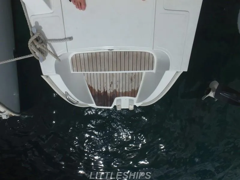 Slide: The Image of Fountaine Pajot MAHE EVO 2015, boat stern over water. - 12