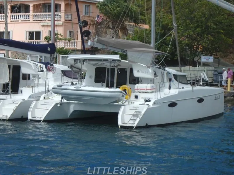 Slide: The Image of Fountaine Pajot MAHE EVO 2015 catamaran docked in harbor. - 2