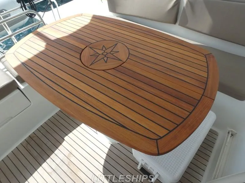 Slide: The Image of Wooden table on Fountaine Pajot MAHE EVO 2015 catamaran. - 23