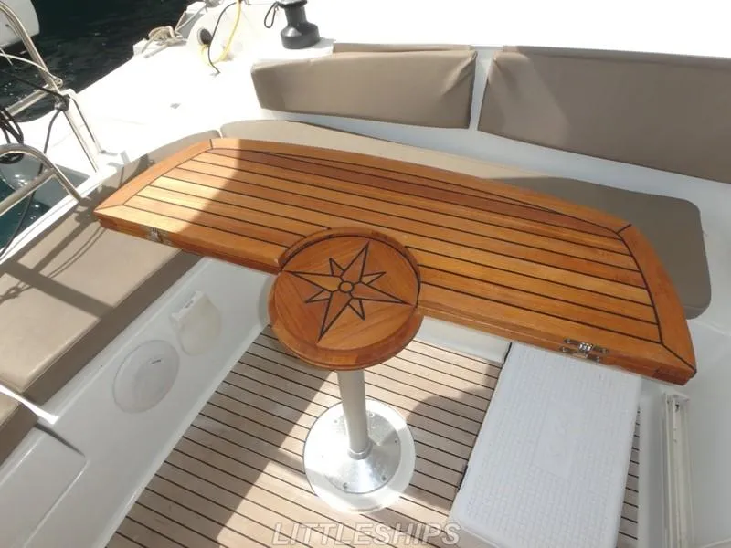 Slide: The Image of Wooden table on Fountaine Pajot MAHE EVO 2015 catamaran. - 24