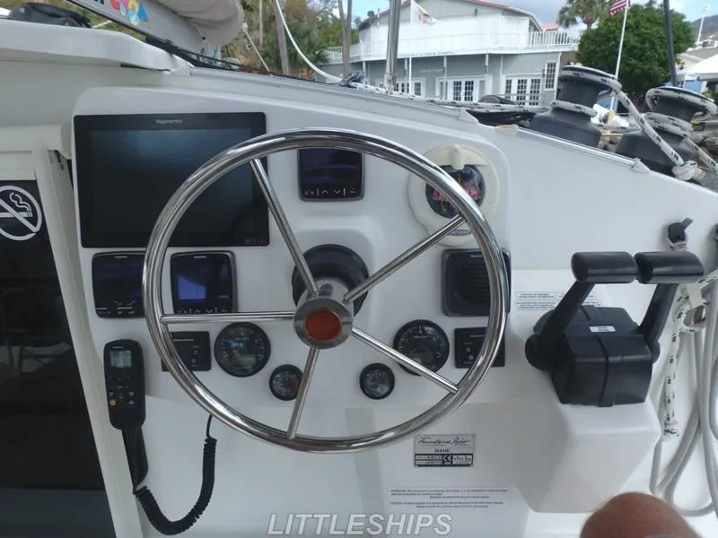 Slide: The Image of 2015 Fountaine Pajot MAHE EVO helm with navigation instruments. - 29