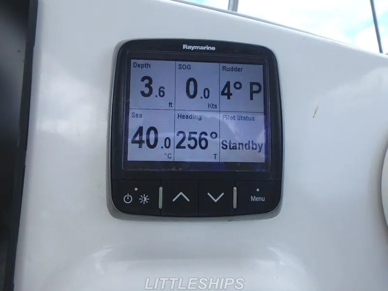 Slide: The Image of Raymarine display on 2015 Fountaine Pajot MAHE EVO showing depth and heading data. - 38