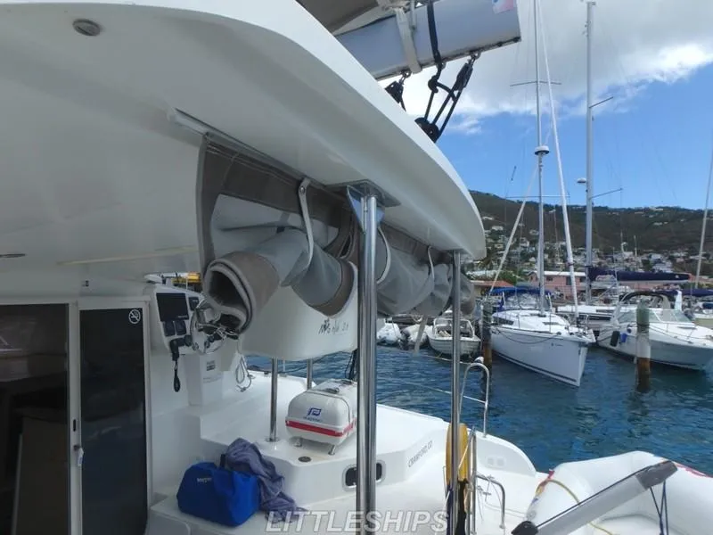 Slide: The Image of Fountaine Pajot MAHE EVO 2015 catamaran docked in harbor. - 4
