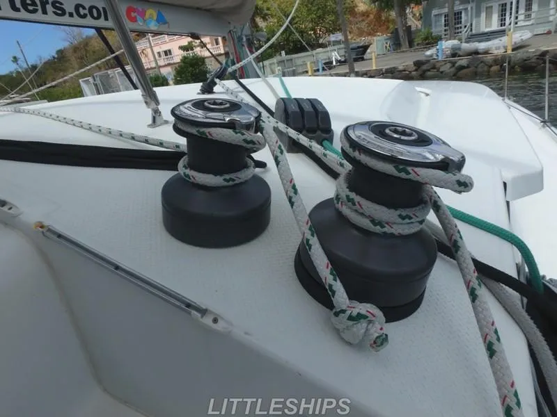 Slide: The Image of Fountaine Pajot MAHE EVO 2015, sailboat deck with winches and ropes. - 45