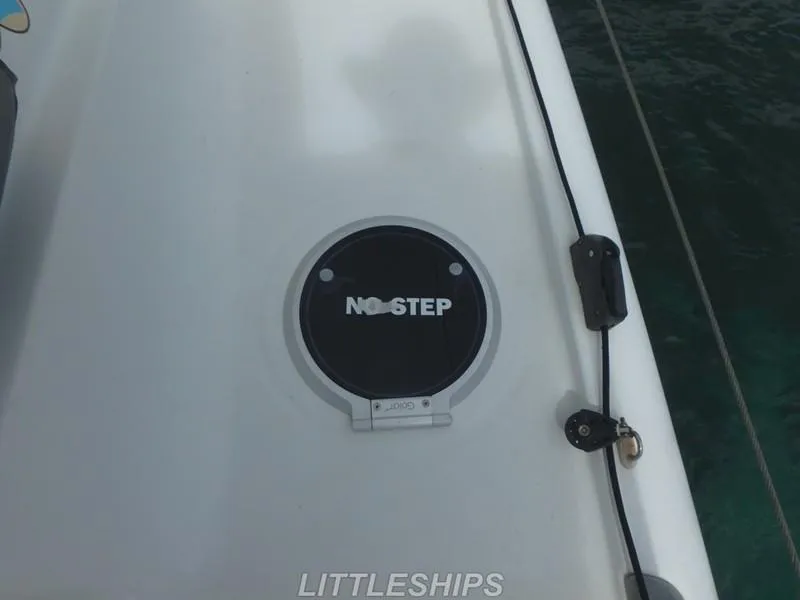 Slide: The Image of Fountaine Pajot MAHE EVO 2015 with "No Step" warning sign. - 47