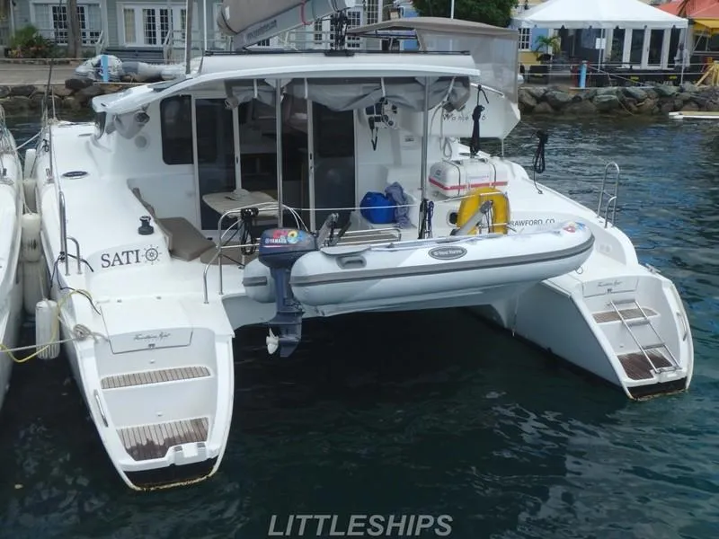 Slide: The Image of Fountaine Pajot MAHE EVO 2015 catamaran docked in harbor. - 7