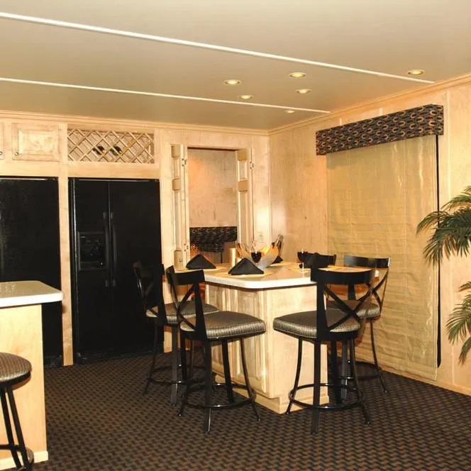 Slide: The Image of 2006 American Waterways Desert Rain Trip 15 interior dining area with black refrigerator and bar stools. - 3